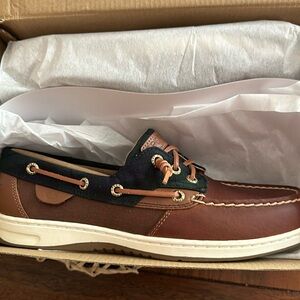 Brand new woman’s size 9 SPERRY sNIB.   Leather brown and some blue green plaid